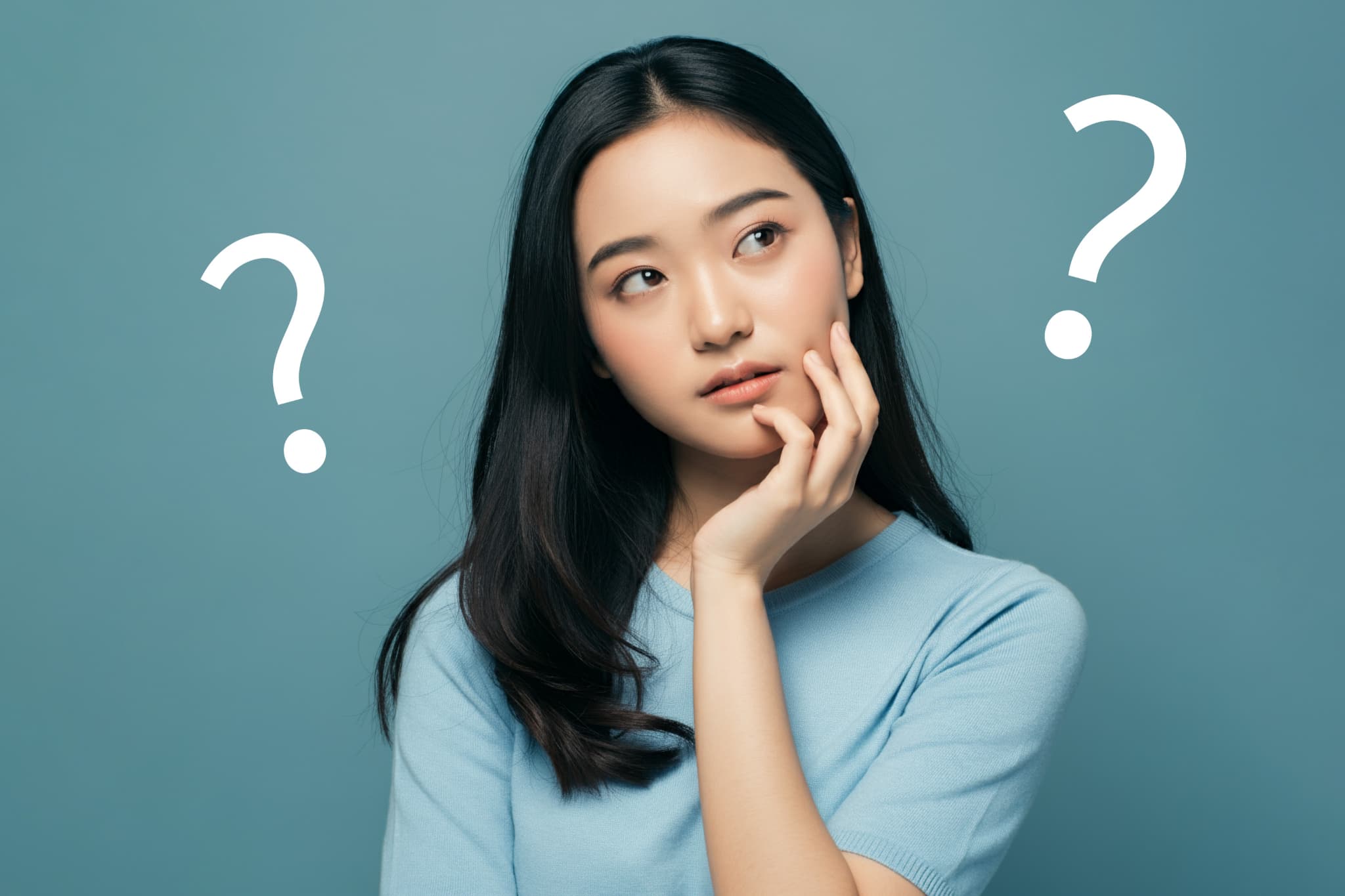 根管治療は何回通うのか考える女性