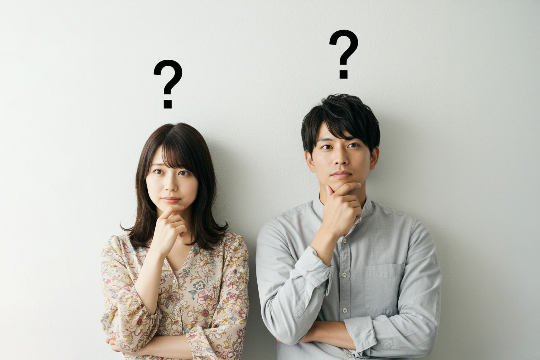 斜めに生えた親知らずは抜いたほうがよいのか考える男女